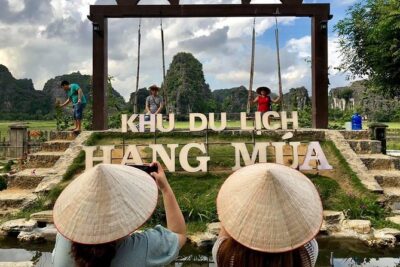 Ninh Binh Daily Tour: Hoa Lu -Mua Cave -Tam Coc- Bike-Swimming with Sunset Party - Mua Cave and the 500-Step View You’ll Earn