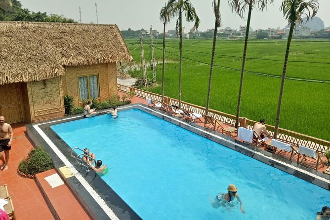 Ninh Binh Daily Tour: Hoa Lu -Mua Cave -Tam Coc- Bike-Swimming with Sunset Party - Bike Through the Countryside (and Why That Mode Works)