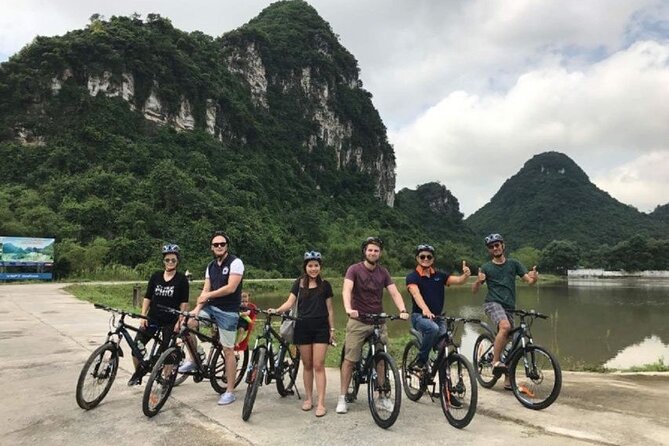 Ninh Binh Day Tour To Visit Hoa Lu -Tam Coc/ Trang An - Mua Cave - Hoa Lu temples of the Dinh & Le dynasties, plus biking around a village