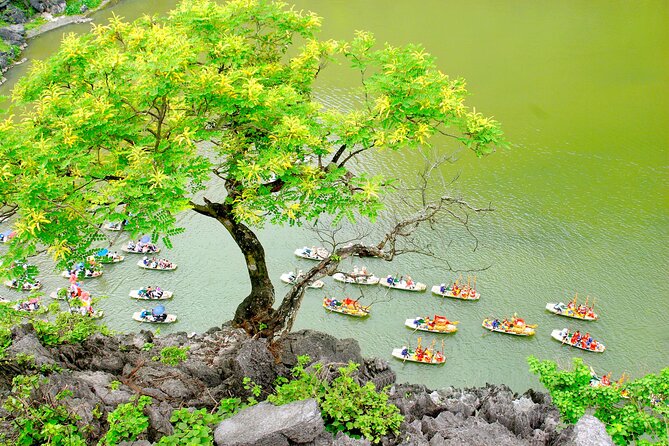 Ninh Binh Full Day Tour with Hoa Lu, Trang An and Mua Cave - Trang An Grottoes Boat Ride: Caves, Limestone, and a Crowd Reality Check