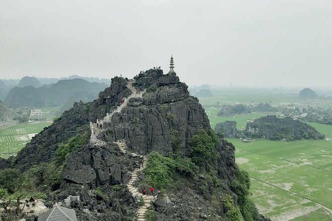 Ninh Binh luxury Day trip to Mua Cave, Tam Coc, Bich Dong, Boat & Bike - Mua Cave and Dragon Mountain: the climb that earns the view