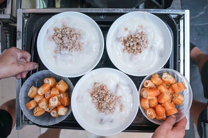 Old Quarter Food Tour in Hanoi - Long Bien Bridge flavors: bánh cuốn and cháo sườn sụn