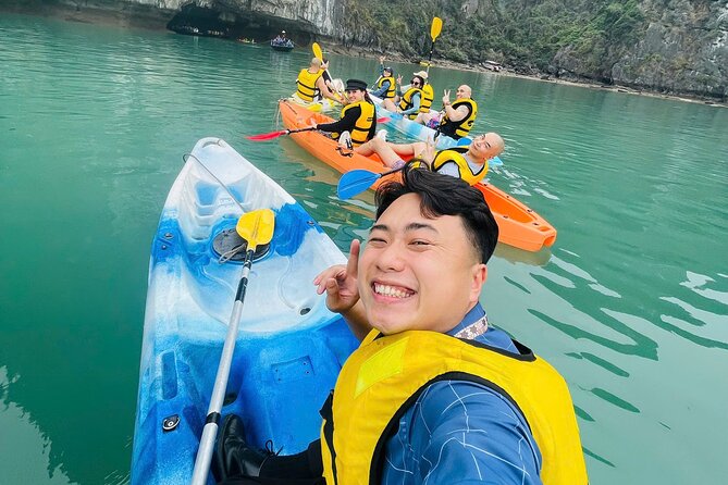 One Day Deluxe Boat Trip in Ha Long Bay - Boarding the Deluxe Cruise: Welcome Drink, Lunch, and Onboard Rhythm