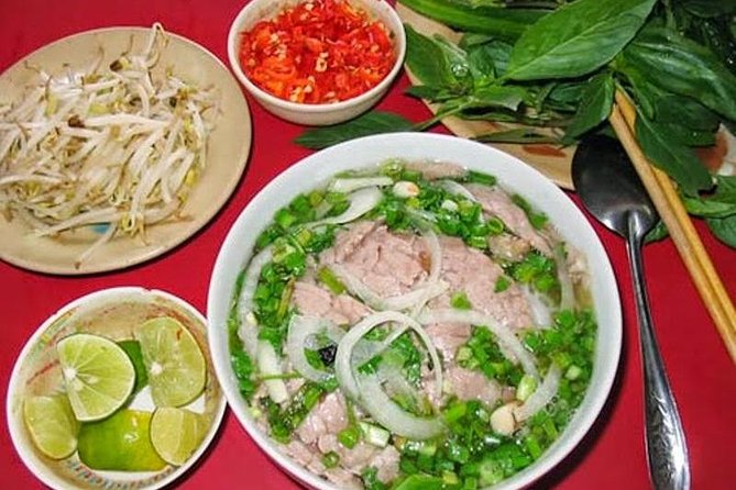 Private Tour: Hanoi Street Foods - Train Street - Hidden Gems - Stop 2: Bach Ma Temple as a calm anchor in the middle of the route