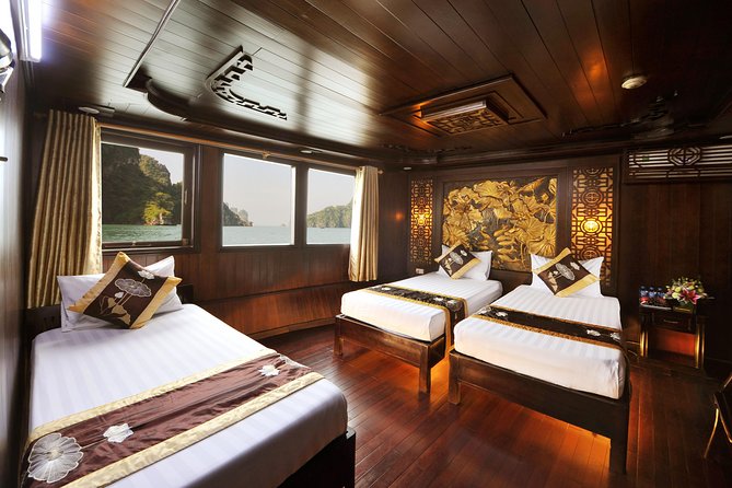 Renea Cruises - BEST Small Boat in Bai Tu Long & Halong Bay - Day 2: Tai Chi on the sundeck, breakfast, then Thien Canh Son Cave