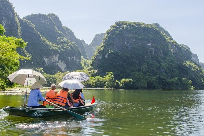 Small Group Ninh Binh Tour : Bai Dinh Trang An Mua Cave Day Tour from Hanoi - Bai Dinh Pagoda: scale, records, and the electric-car shortcut