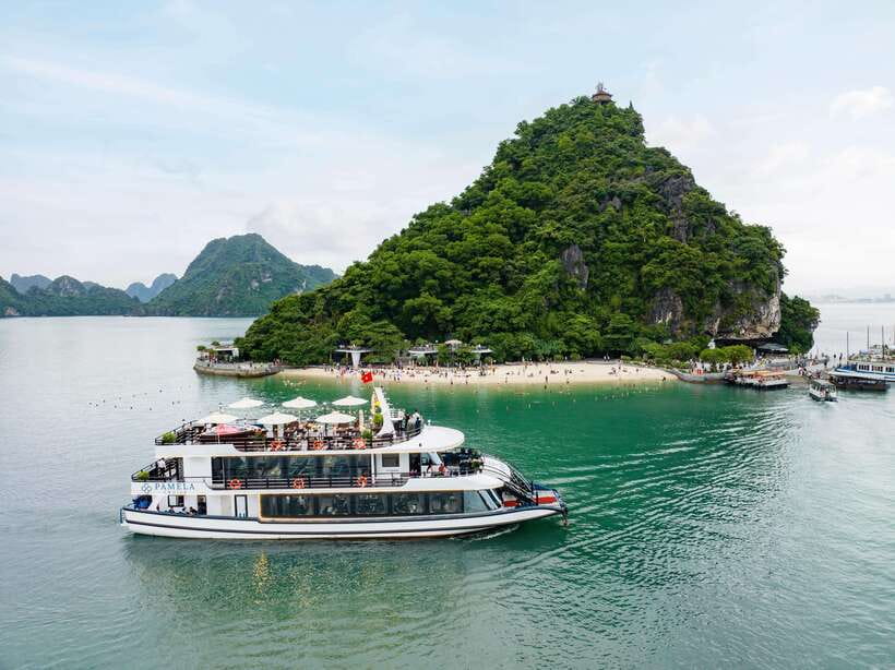 The BEST Ha Long Bay 5-Star Day Trip with Pamela Cruise - Stop 2: Luon Cave kayaking in calm water