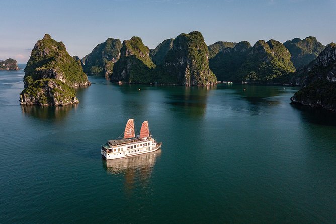 Top 1 Ha Long-Lan Ha Bay Luxury 5 Star Cruises & Balcony Cabin - Day 1 Evening: Sunset Cruising and the Calm Side of the Bay