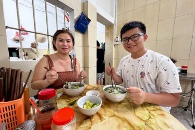 Vespa Tour HANOI BACK STREETS: FOOD+LOCAL LIFE+CULTURE & FUN - Flea market + Nguyen Công Trứ old apartments: the “mechanic side” of Hanoi