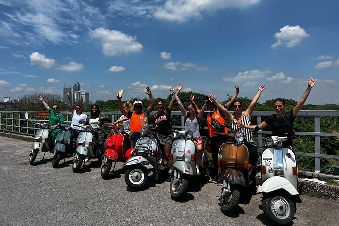 Vespa Tour HANOI BACK STREETS: FOOD+LOCAL LIFE+CULTURE & FUN - Hữu Tập Lake, mosaic wall views, and the downed B-52