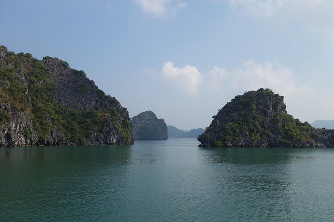 Vietnam At Glance In 7 Days - From Hanoi to Ho Chi Minh City - Halong Bay cruise days: sunrise, Tai Chi, and limestone cave time