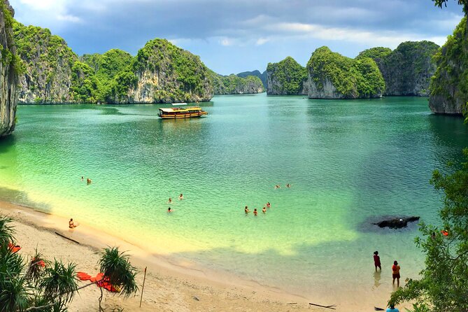 What a great combination, day cruise and night kayak with glowing biolumenescent - Ba Trai Dao Beach: kayaking, swimming, and relaxing in a quieter pocket
